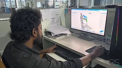 KRS DISPERMAHLTECHNIK engineer designing a machine in CAD