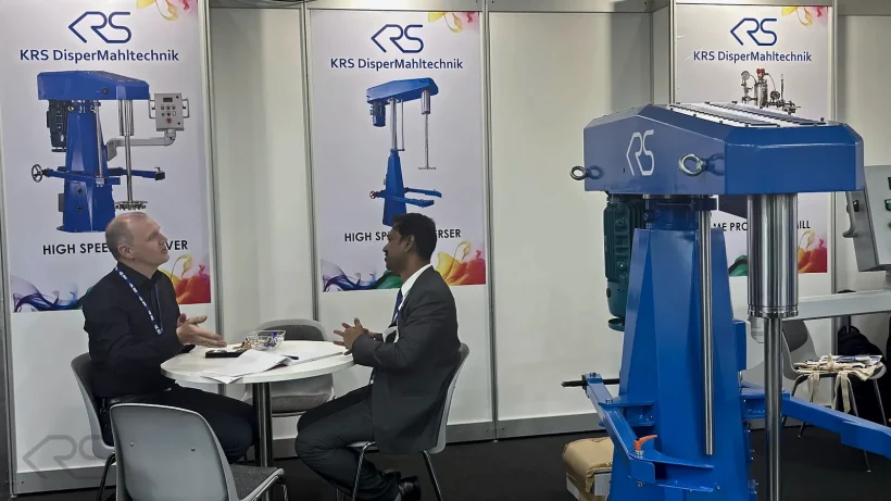 Meeting at the KRS stand at ECS 2025 with High Speed Disperser in the foreground
