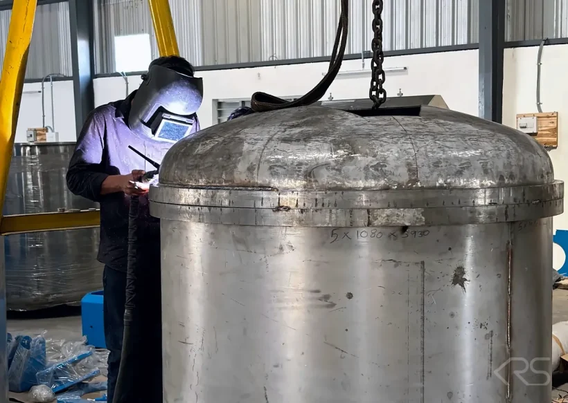 KRS DISPERMAHLTECHNIK welder fabricating a stainless steel process vessel in the KRS workshop